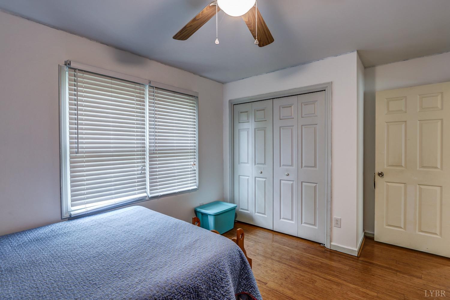 127 Southern Lane Monroe, VA 24574 - Photo 19 of 44 a bedroom with a bed and a window