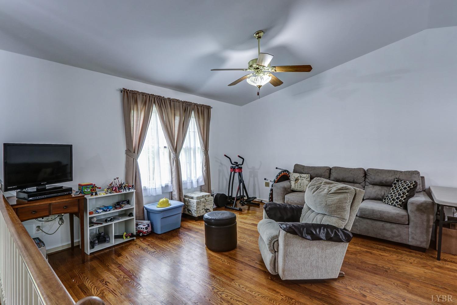 127 Southern Lane Monroe, VA 24574 - Photo 2 of 44 a living room with furniture and a flat screen tv