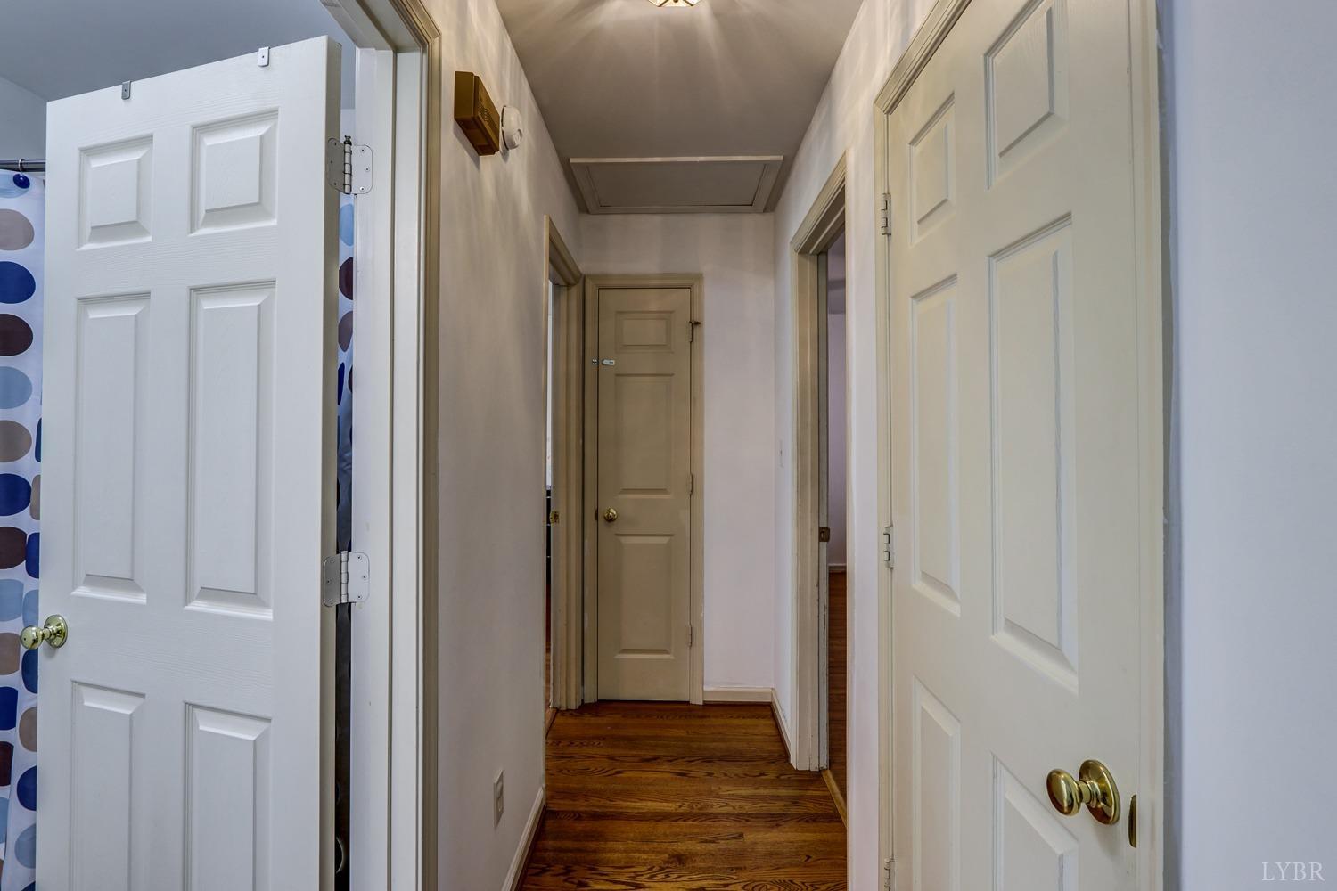 127 Southern Lane Monroe, VA 24574 - Photo 23 of 44 a view of a hallway with wooden cabinets and glass door