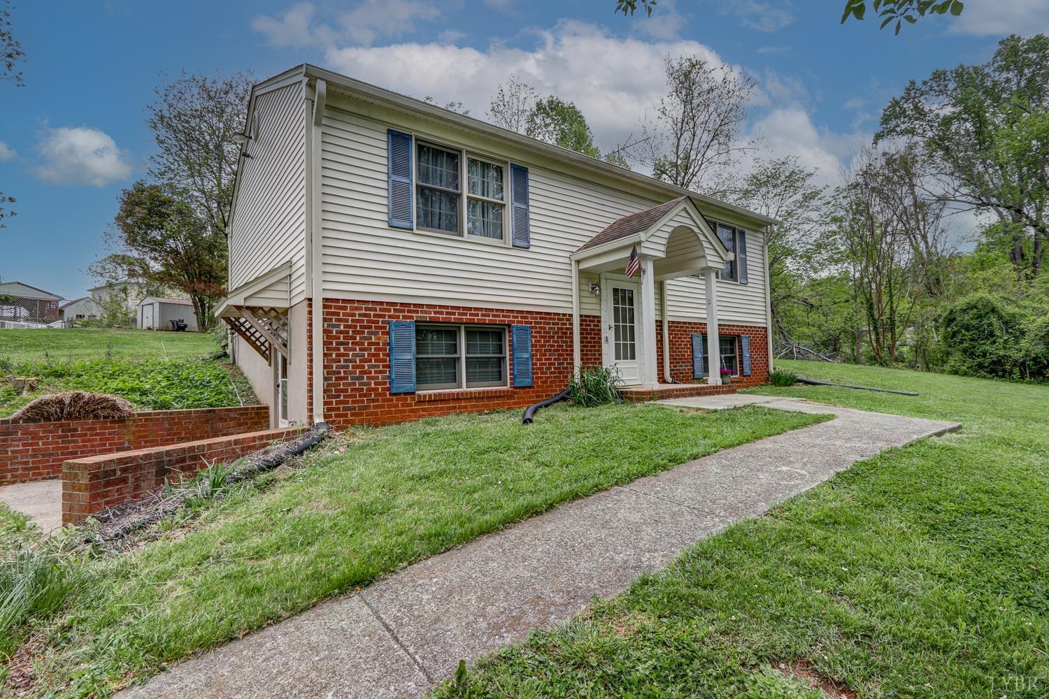 127 Southern Lane Monroe, VA 24574 - Photo 38 of 44 a front view of a house with a yard