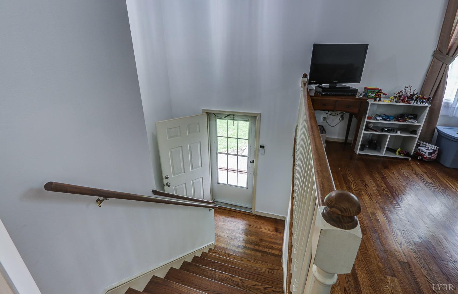 127 Southern Lane Monroe, VA 24574 - Photo 10 of 44 a view of a room with wooden floor and furniture