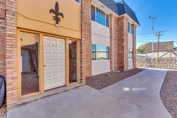 a view of a house with a wooden door