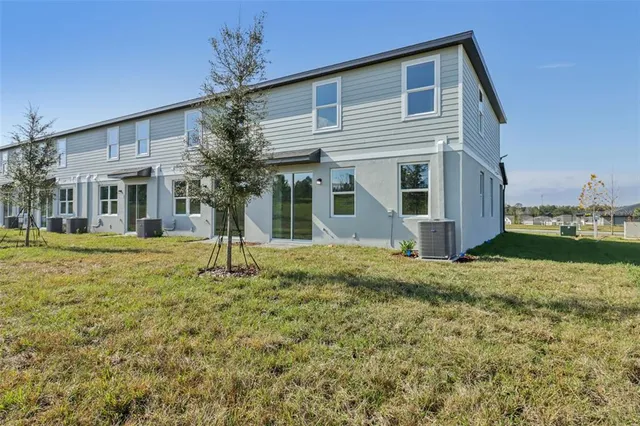a house with river in front of it