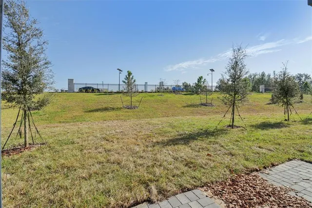 a view of a yard with an outdoor space