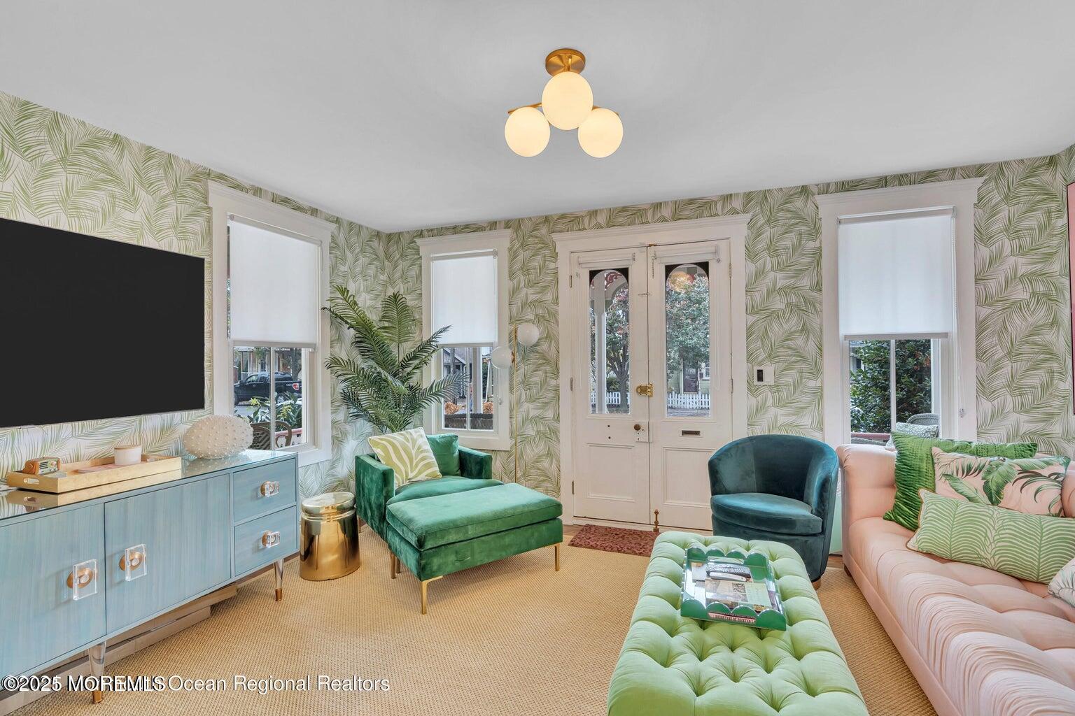 69 Webb Avenue Ocean Grove, NJ 07756 - Photo 12 of 70 a living room with furniture and a flat screen tv