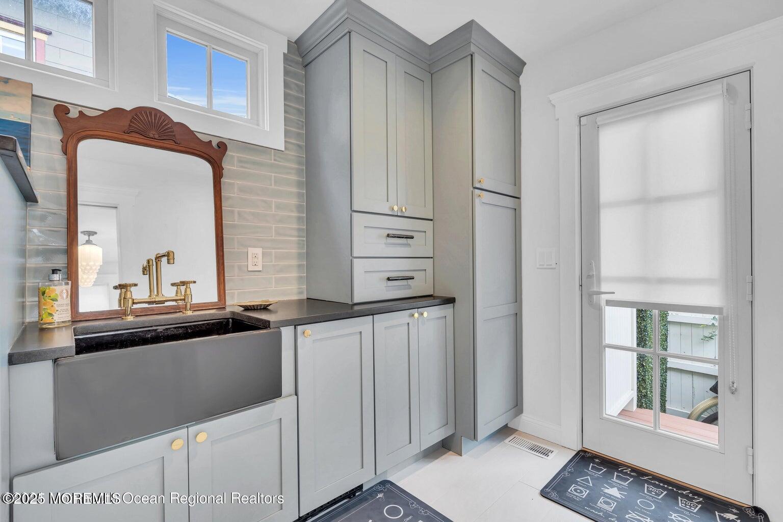 69 Webb Avenue Ocean Grove, NJ 07756 - Photo 36 of 70 a kitchen with stainless steel appliances granite countertop a refrigerator and a sink