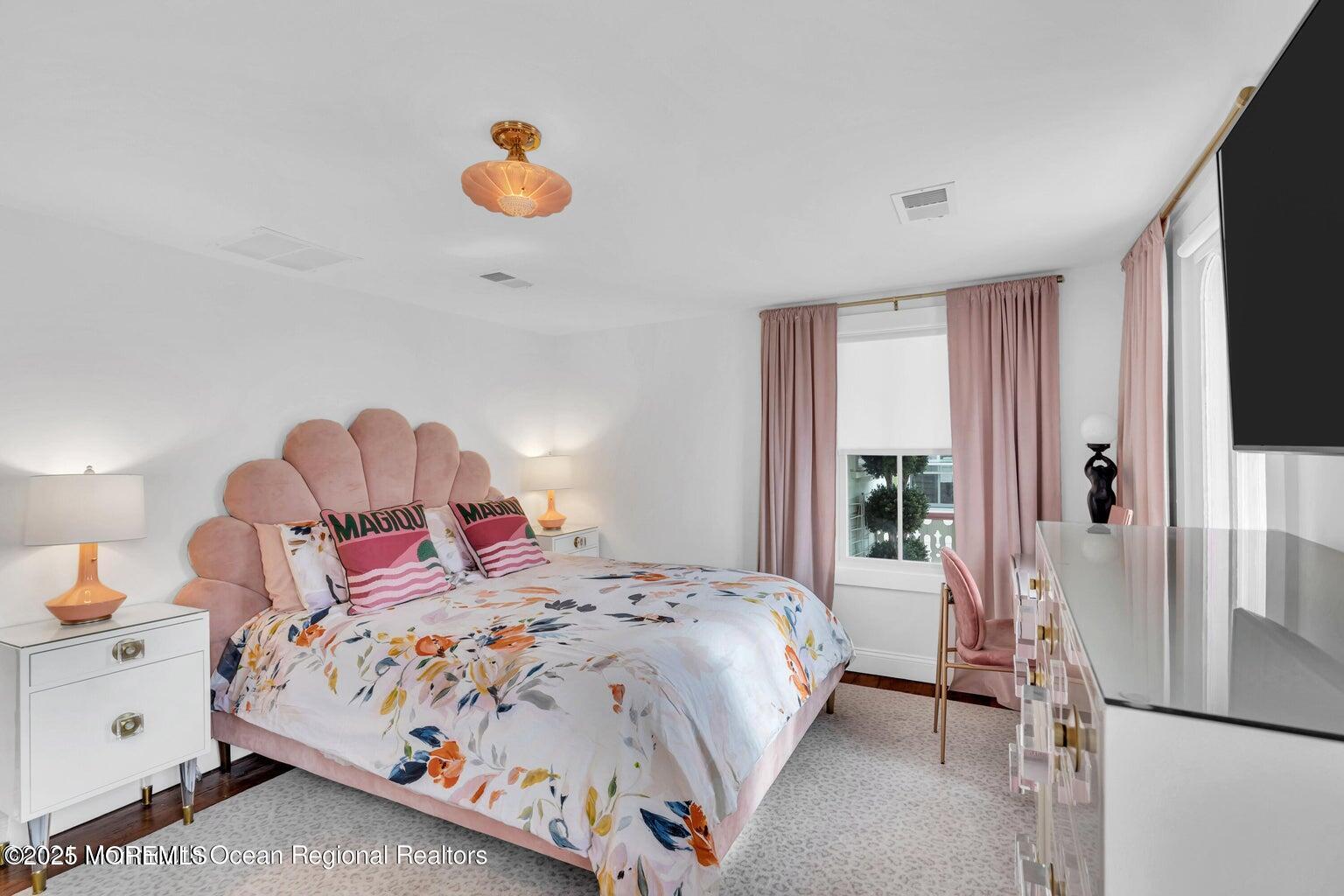 69 Webb Avenue Ocean Grove, NJ 07756 - Photo 42 of 70 a bedroom with a bed and window