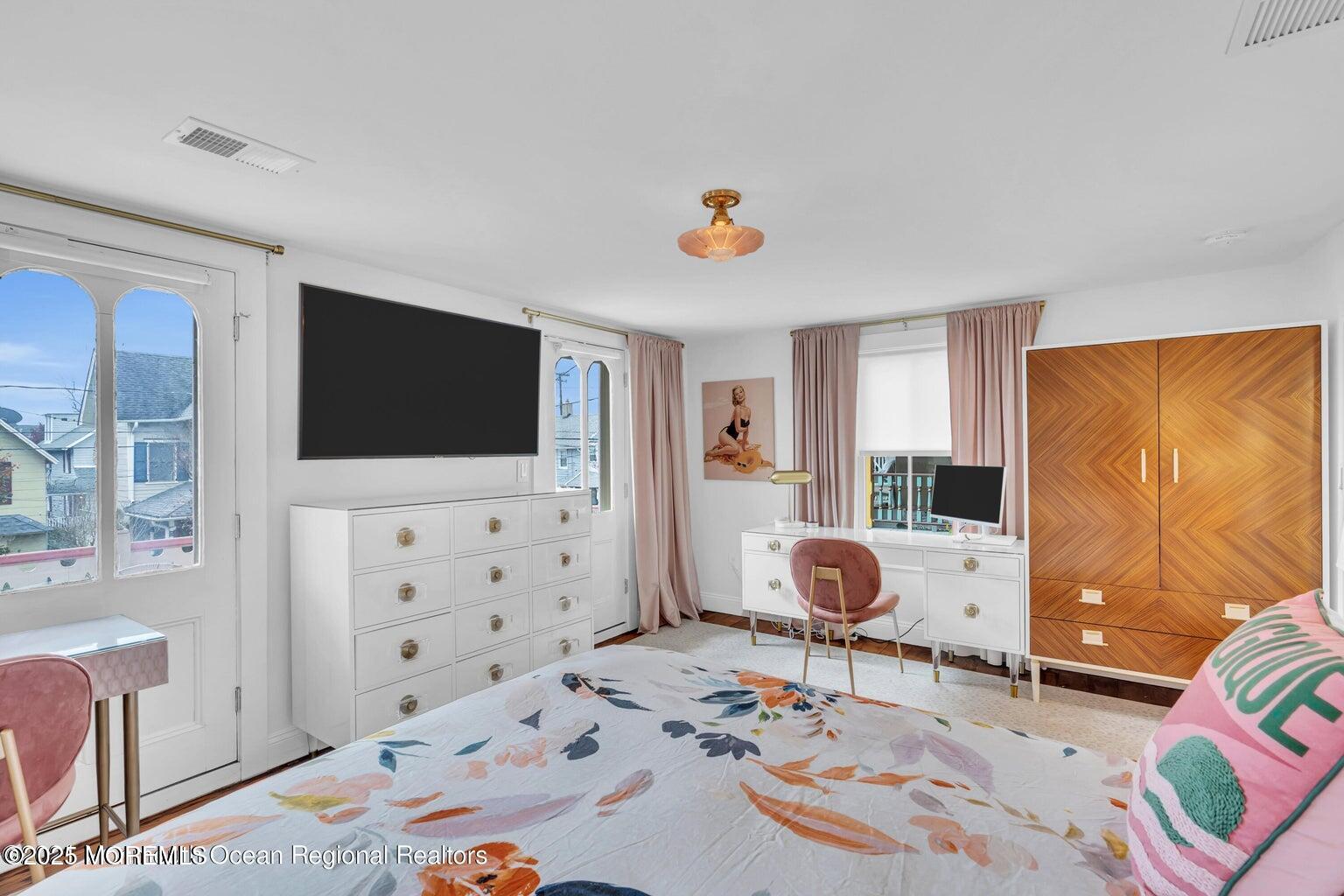 69 Webb Avenue Ocean Grove, NJ 07756 - Photo 43 of 70 a living room with furniture and a flat screen tv