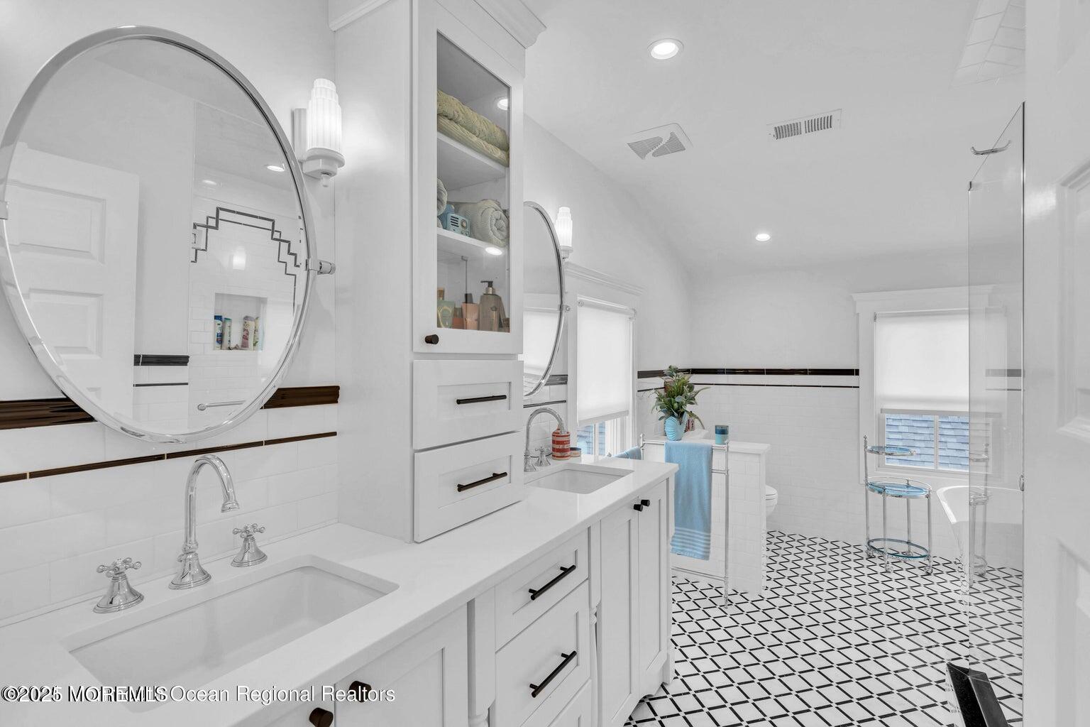 69 Webb Avenue Ocean Grove, NJ 07756 - Photo 48 of 70 a bathroom with a sink and a mirror