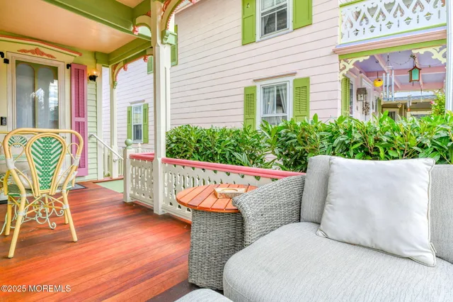 a view of a chairs and table in the patio