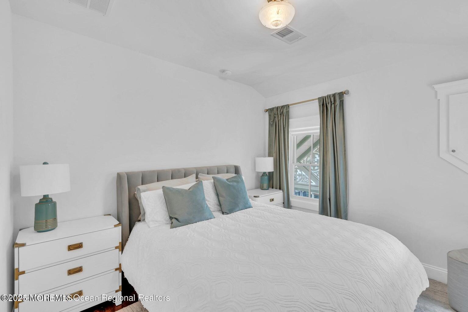 69 Webb Avenue Ocean Grove, NJ 07756 - Photo 55 of 70 a bedroom with a bed and a window
