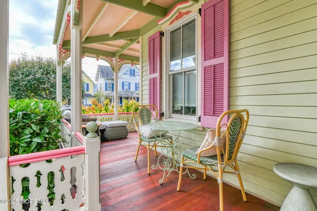 a view of a chairs and table in the patio
