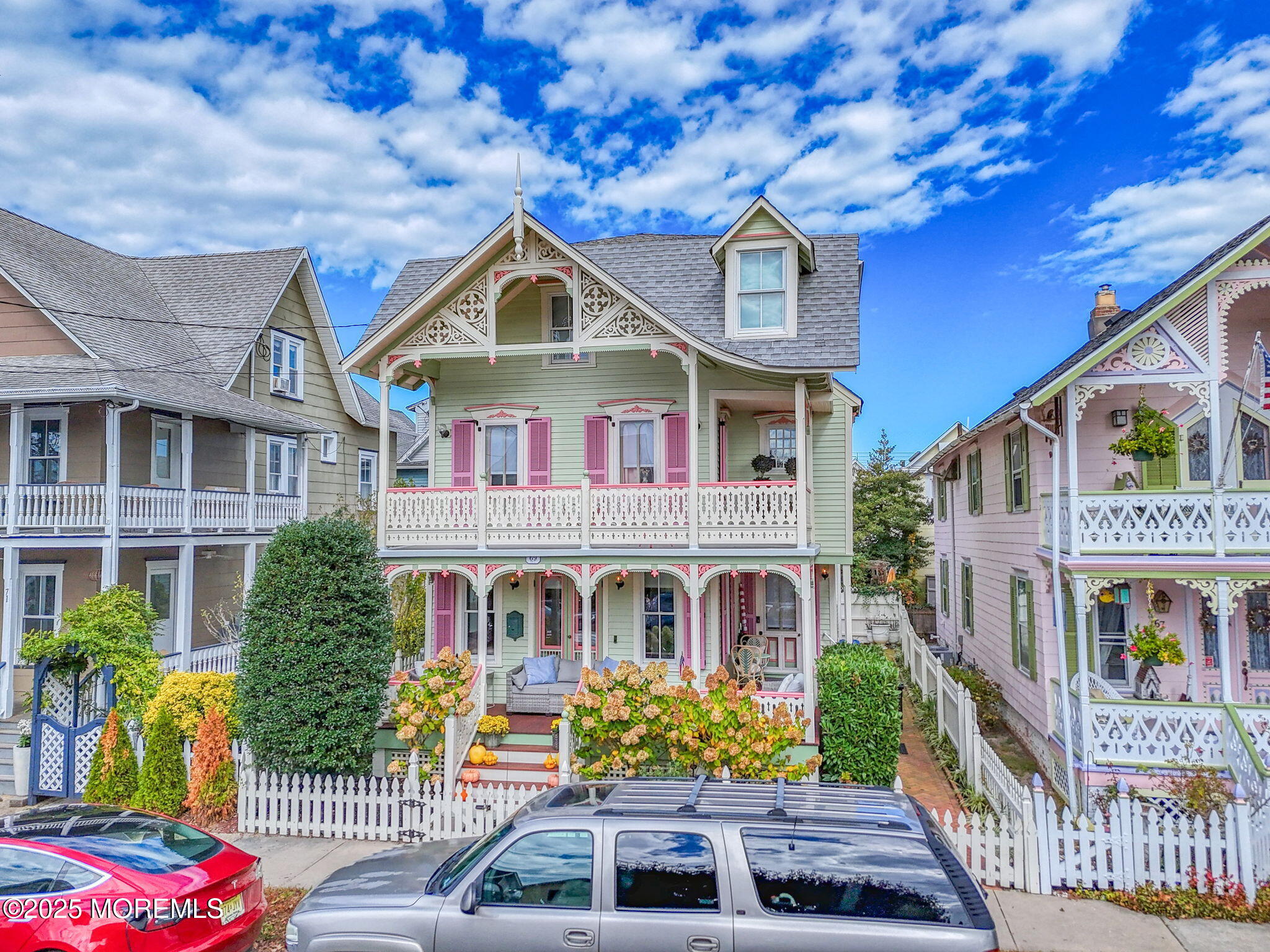 69 Webb Avenue Ocean Grove, NJ 07756 - Photo 70 of 70 a front view of multi story residential apartment building with yard