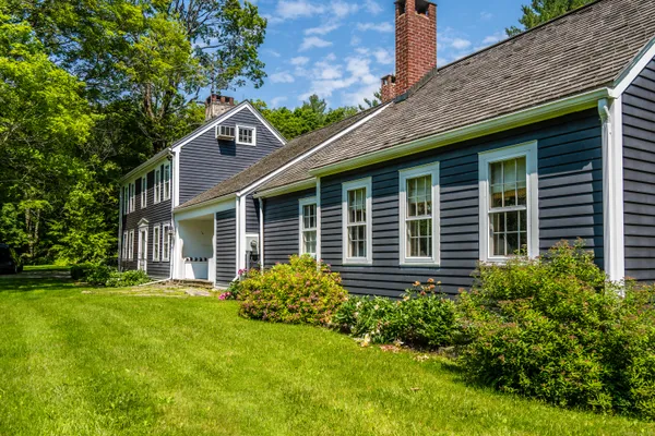 a house view with a garden space
