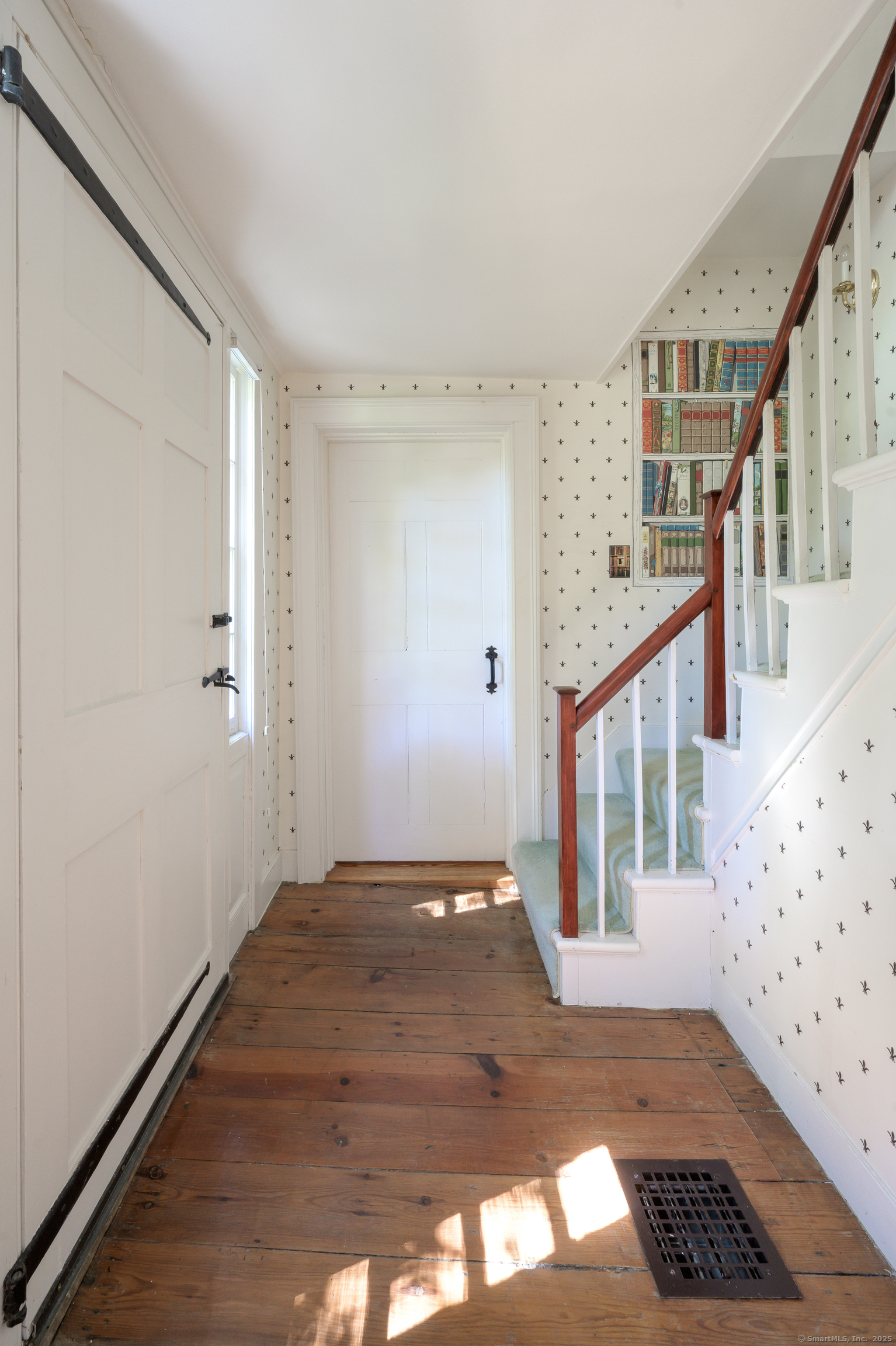 130 Sharon Mountain Road Sharon, CT 06069 - Photo 22 of 38 a view of an entryway with wooden floor and door