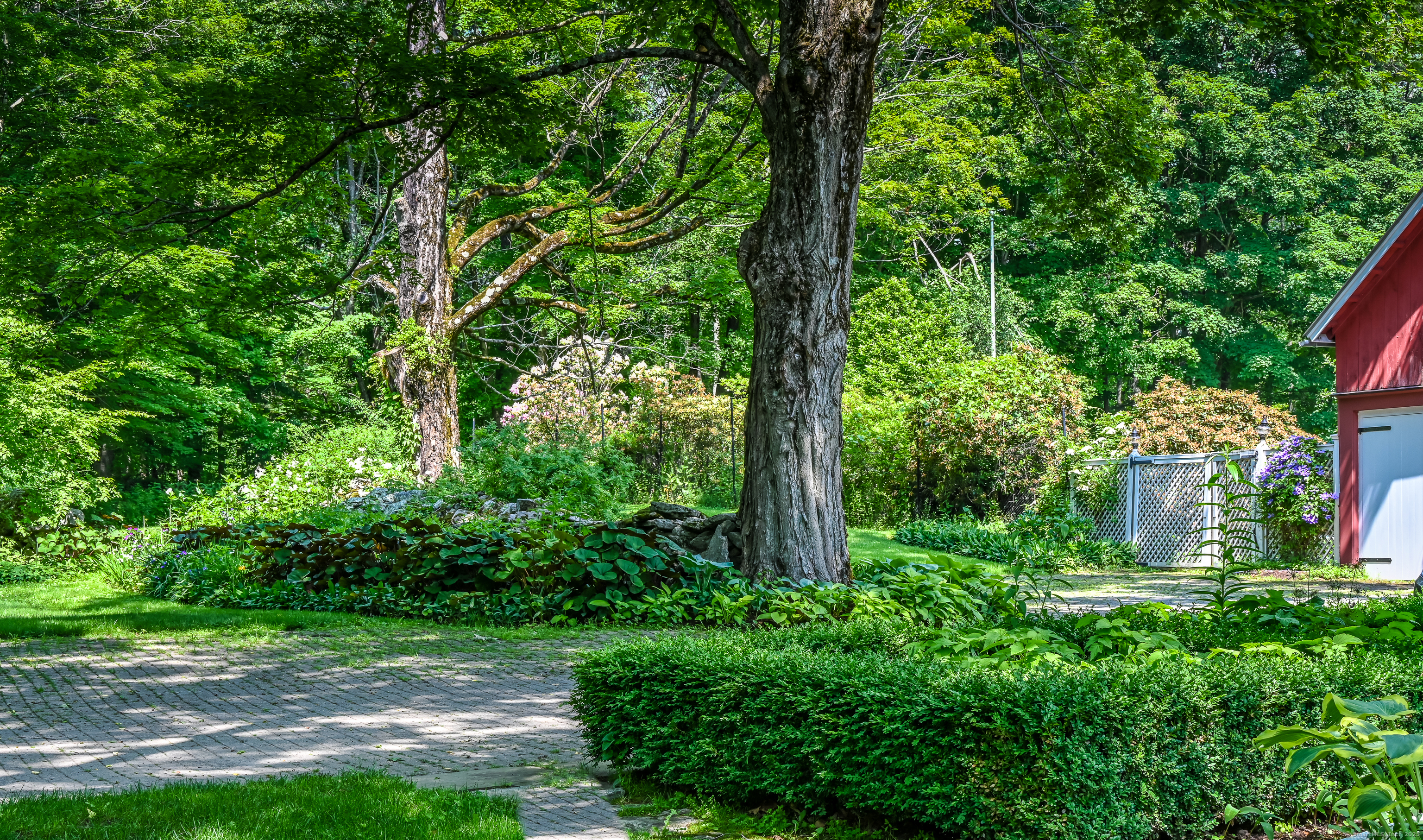 130 Sharon Mountain Road Sharon, CT 06069 - Photo 36 of 38 a view of a yard with plants and a large trees