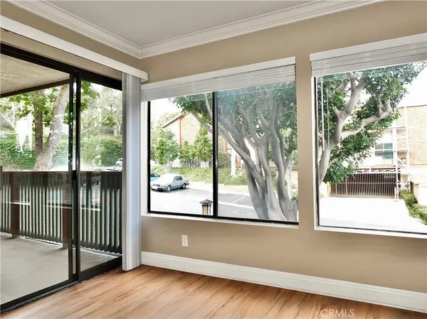 a view of a room that has a large window