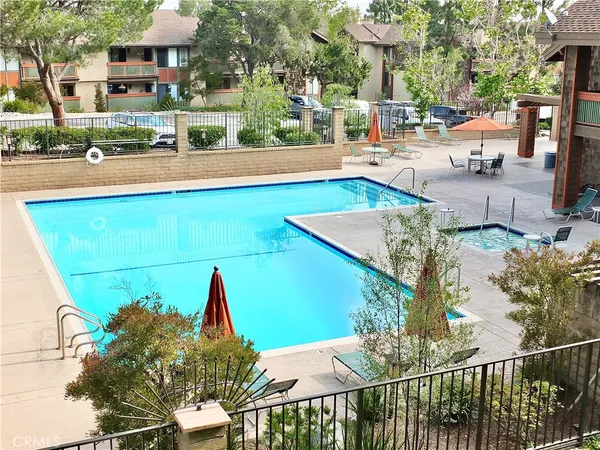 a view of a swimming pool and outdoor space