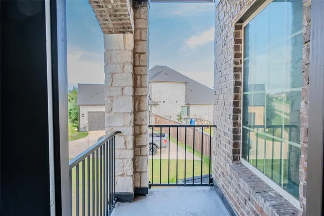 a view of a balcony with a porch