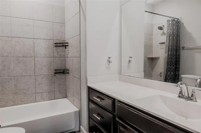 a bathroom with a sink and a bathtub