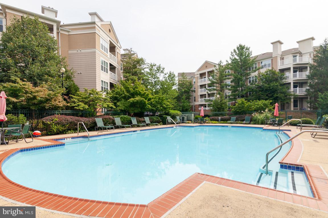 12919 Alton Square, Unit 302 Herndon, VA 20170 - Photo 20 of 21 a view of outdoor space yard and swimming pool