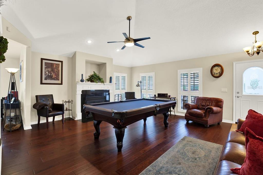 2021 Meadow Rue Court Trinity, FL 34655 - Photo 5 of 41 a living room with furniture and wooden floor
