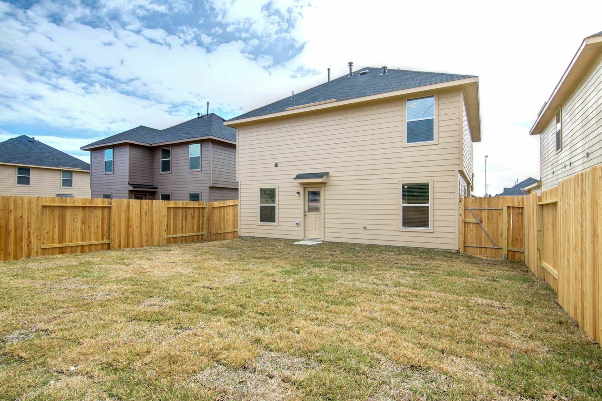 2323 Kolby Way Houston, TX 77073 - Photo 2 of 13 a view of a house with a yard
