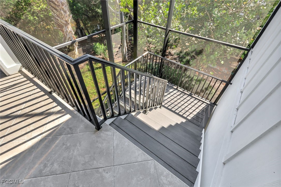 1044 Fish Crow Road Sanibel, FL 33957 - Photo 33 of 36 a view of balcony and wooden floor