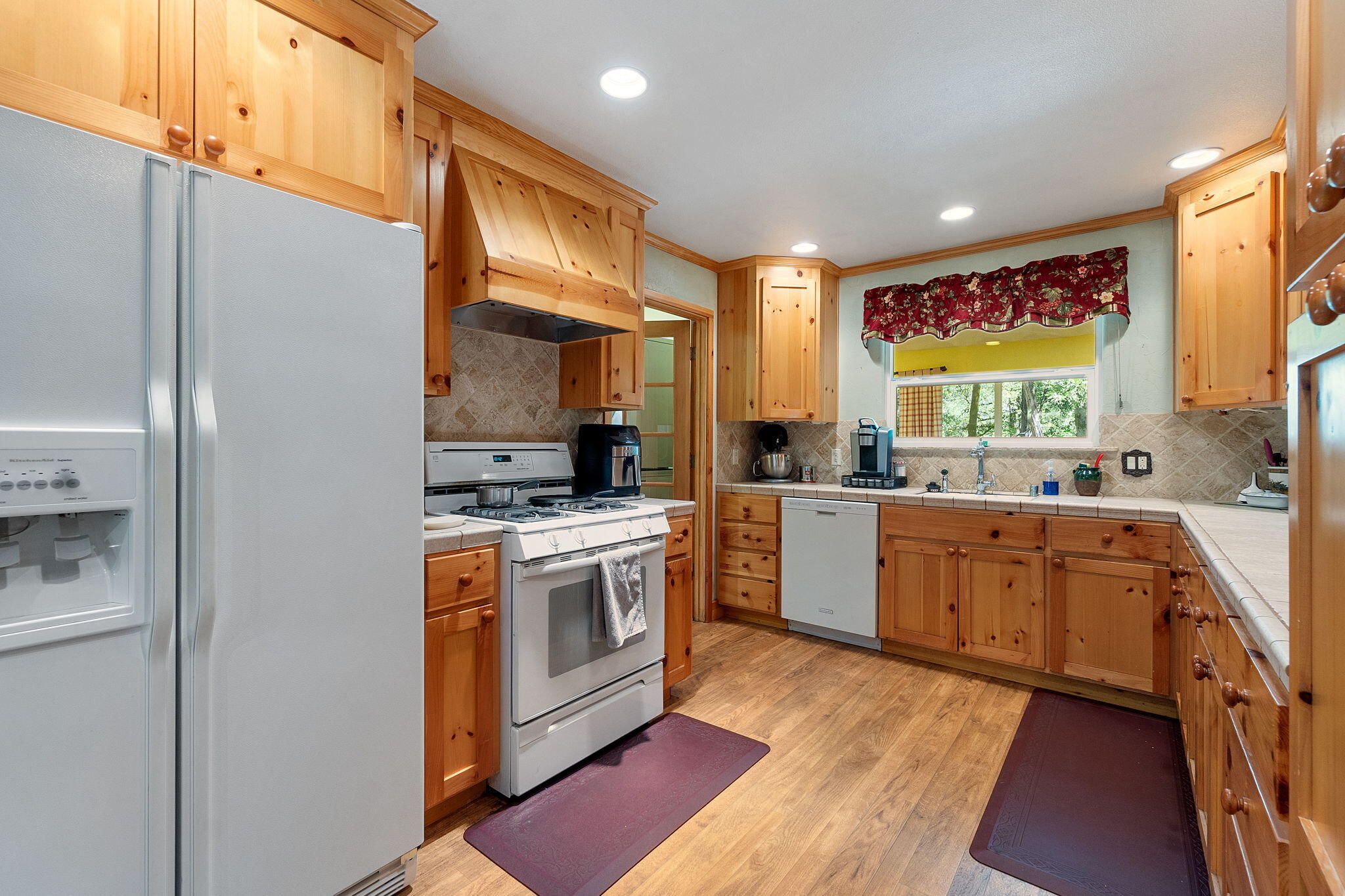 30303 Oak Run To Fern Road Whitmore, CA 96096 - Photo 10 of 75 a kitchen with stainless steel appliances granite countertop a stove a sink and a refrigerator