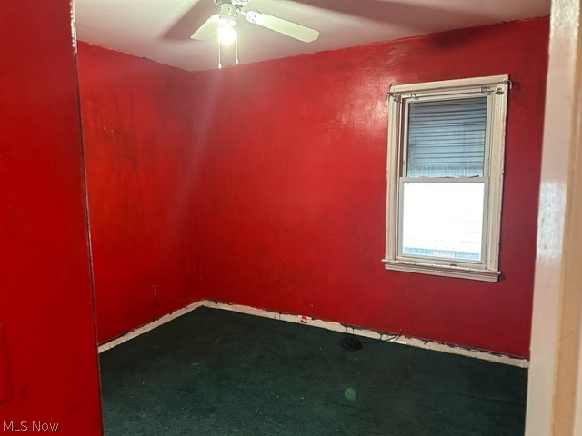 5615 Dunham Road Maple Heights, OH 44137 - Photo 16 of 29 Unfurnished room with carpet flooring and ceiling fan