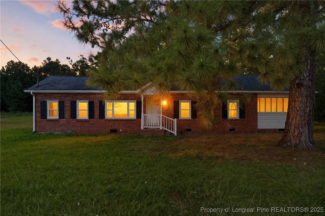 8306 Godwin-Falcon Road Godwin, NC 28344 - Photo 1 of 50 a view of a house with a yard