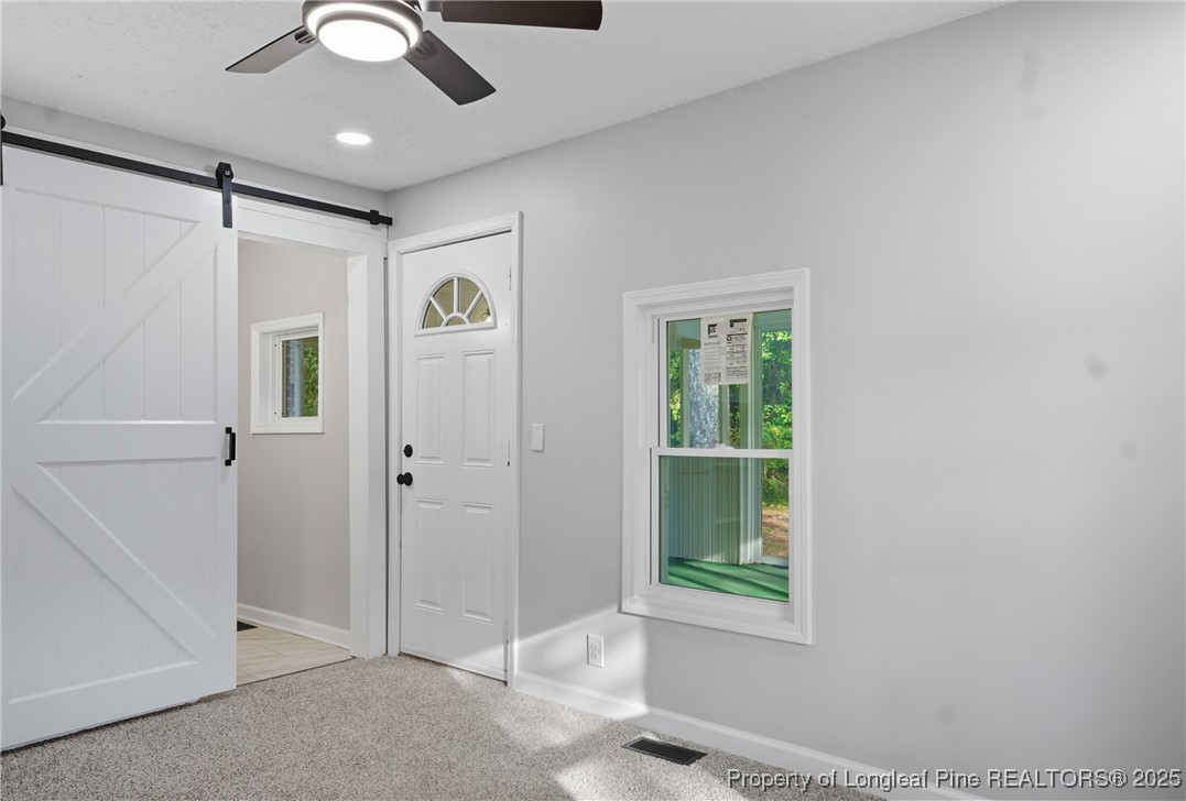 8306 Godwin-Falcon Road Godwin, NC 28344 - Photo 27 of 50 a view of an empty room with a window