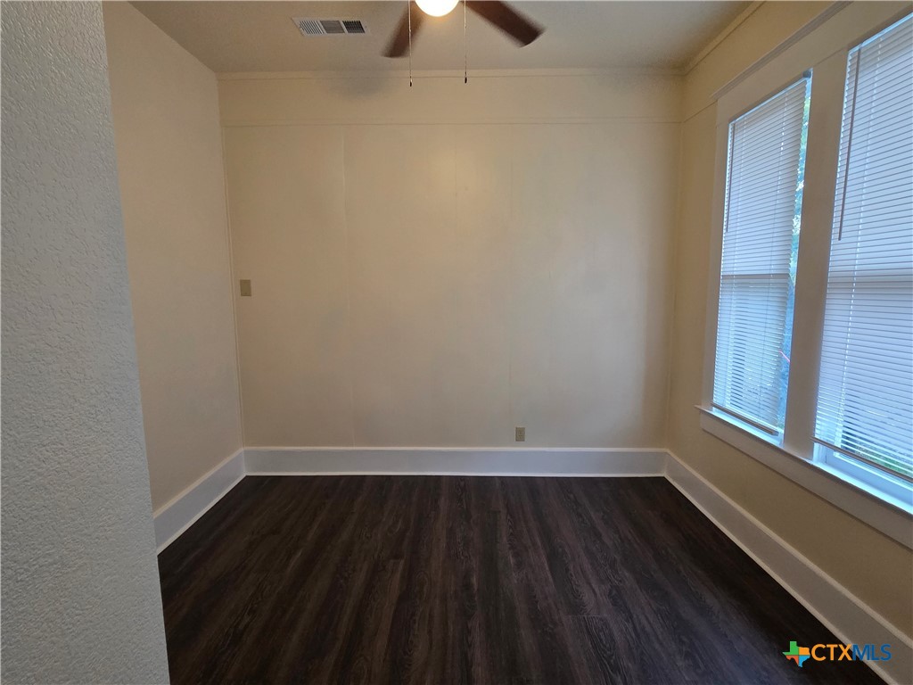 1214 South 11th Street Temple, TX 76504 - Photo 8 of 23 a view of wooden floor in an empty room
