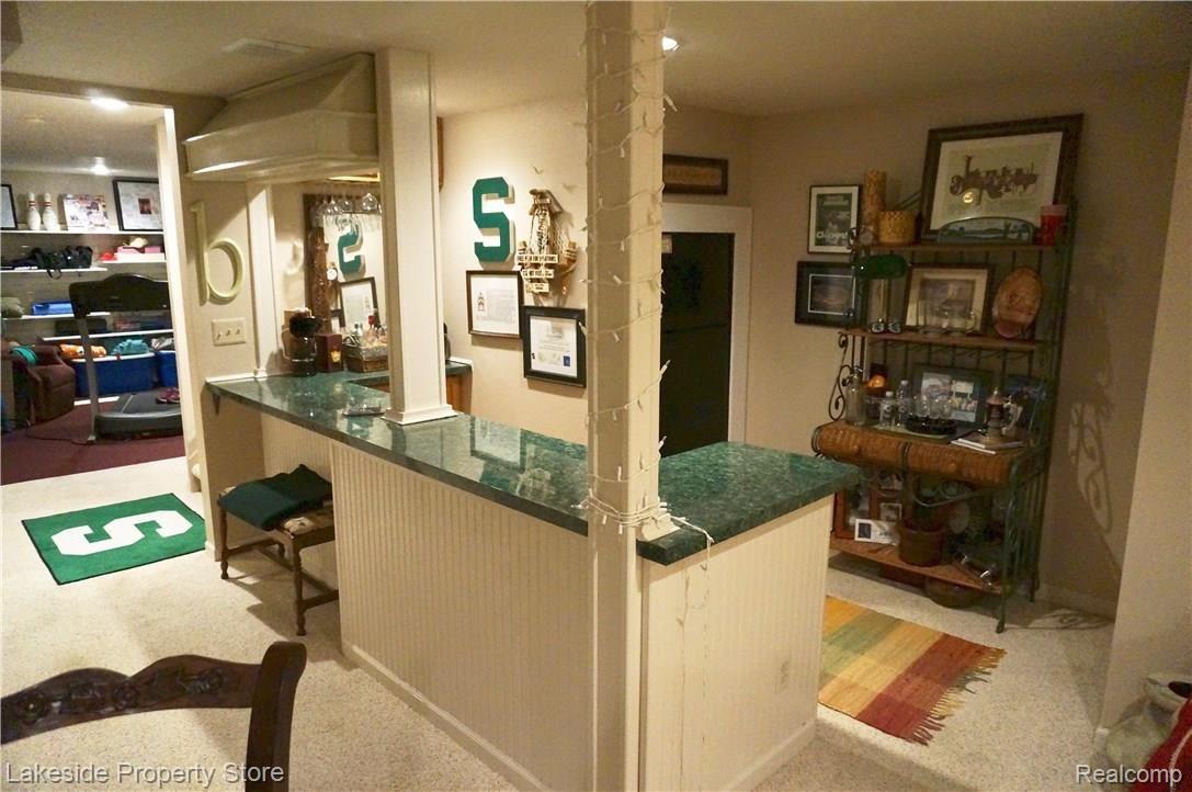 2869 West Avon Road Rochester, MI 48309 - Photo 40 of 47 Bar With Built-In Refrigerator