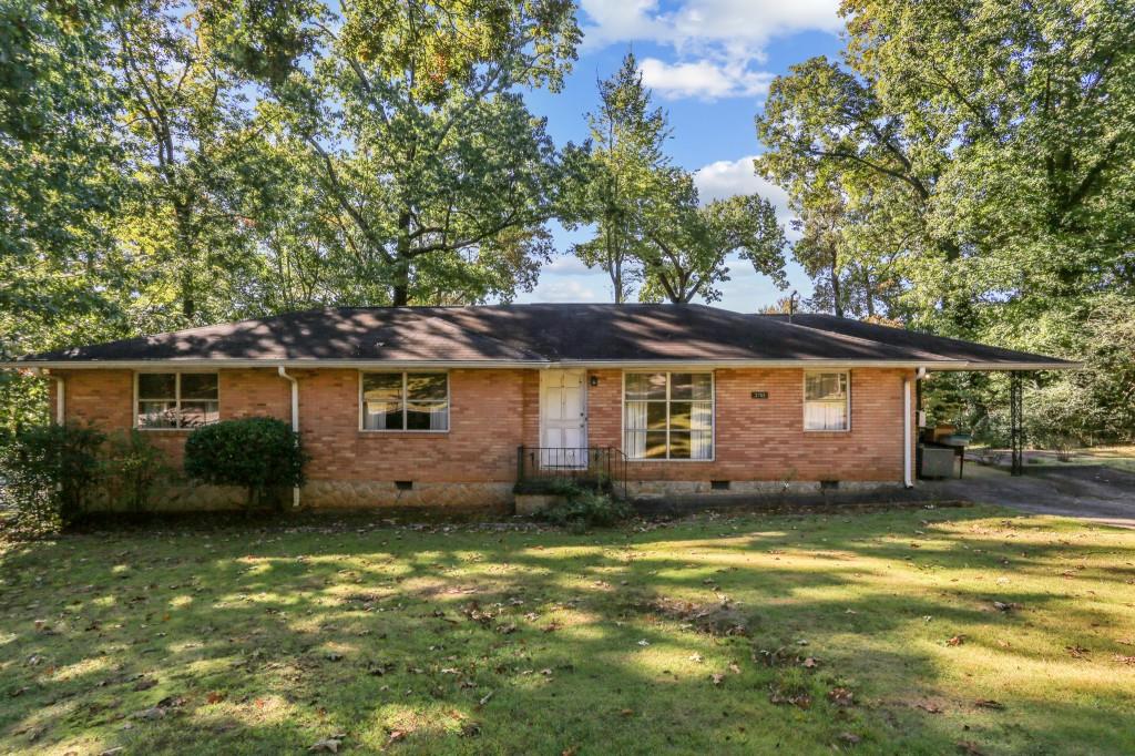 2755 Mt Olive Drive Decatur, GA 30033 - Photo 1 of 1 a front view of a house with a garden