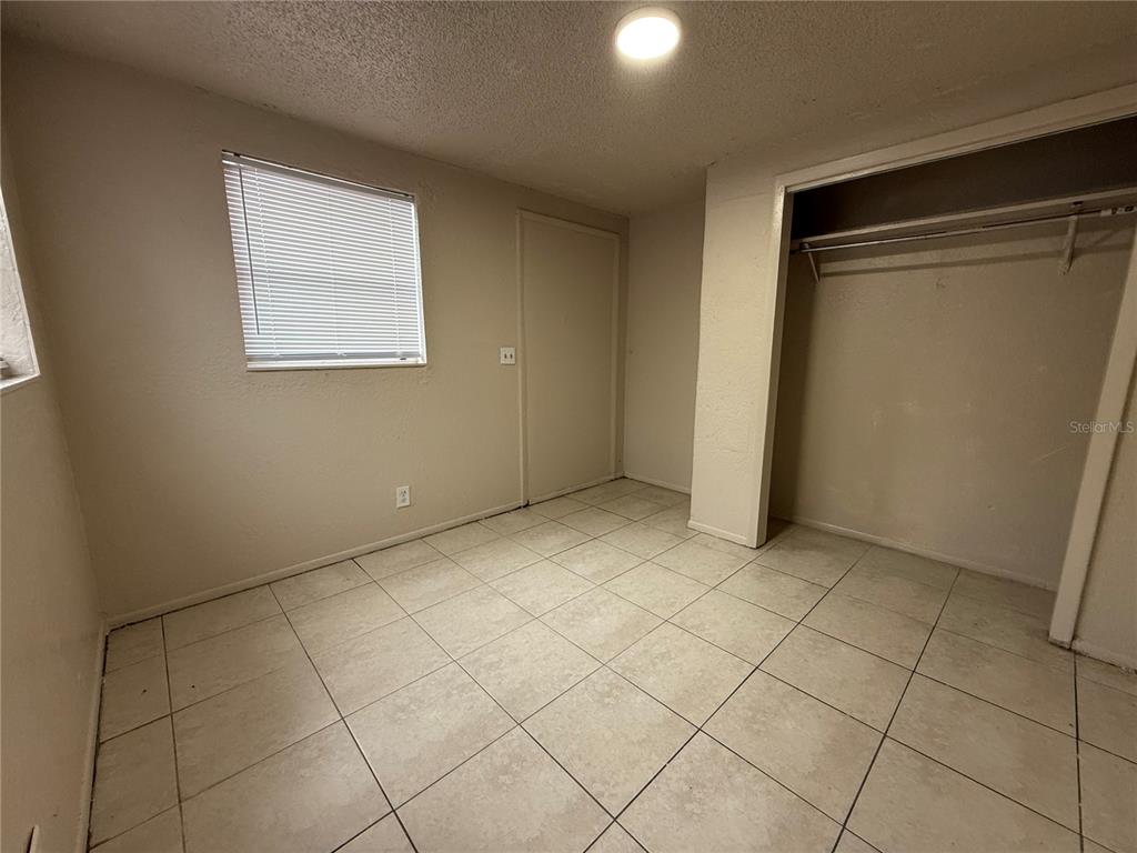4570 Transport Road Bartow, FL 33830 - Photo 4 of 15 an empty room with windows