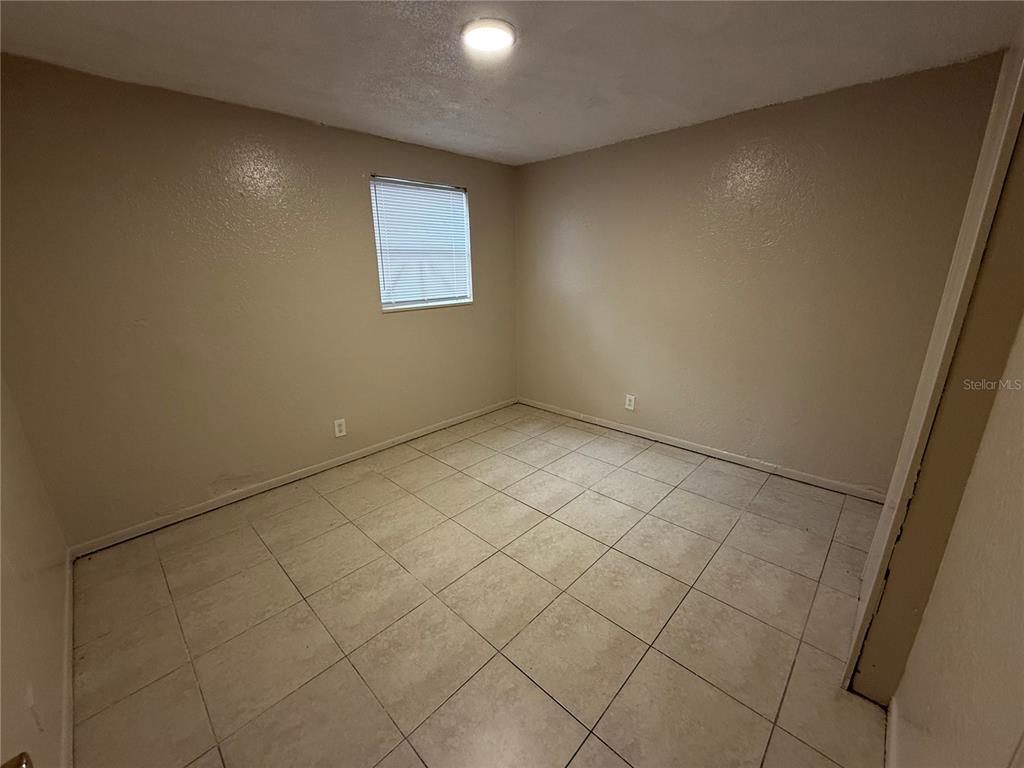 4570 Transport Road Bartow, FL 33830 - Photo 5 of 15 an empty room with windows