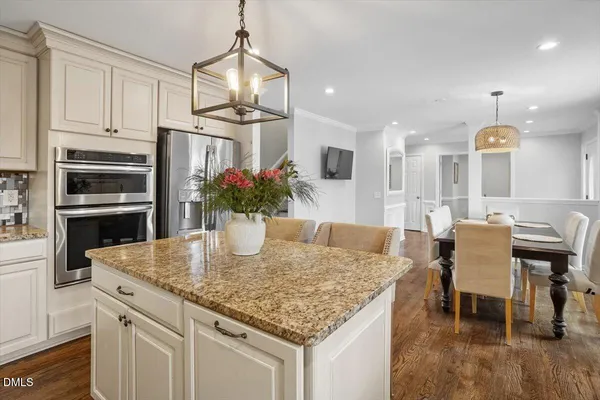 a living room with furniture fireplace and a flat screen tv