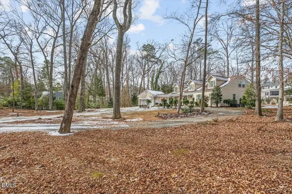 a house with trees in front of it