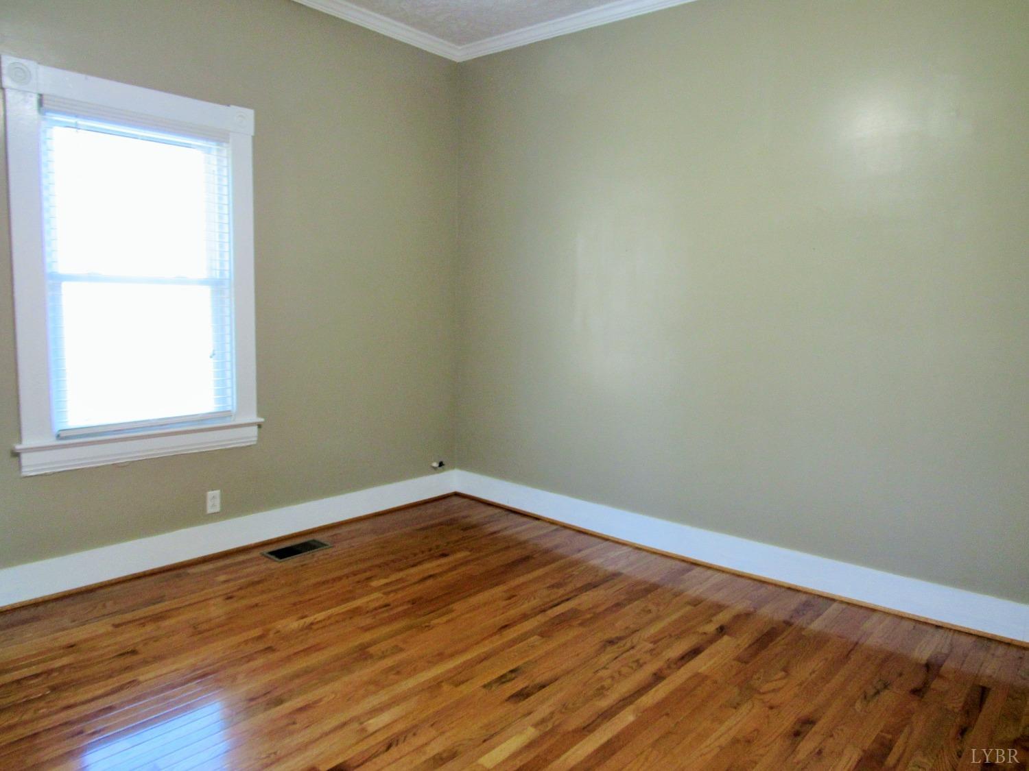 1697 South Amherst Highway Amherst, VA 24521 - Photo 12 of 45 a view of a room with wooden floor and a window