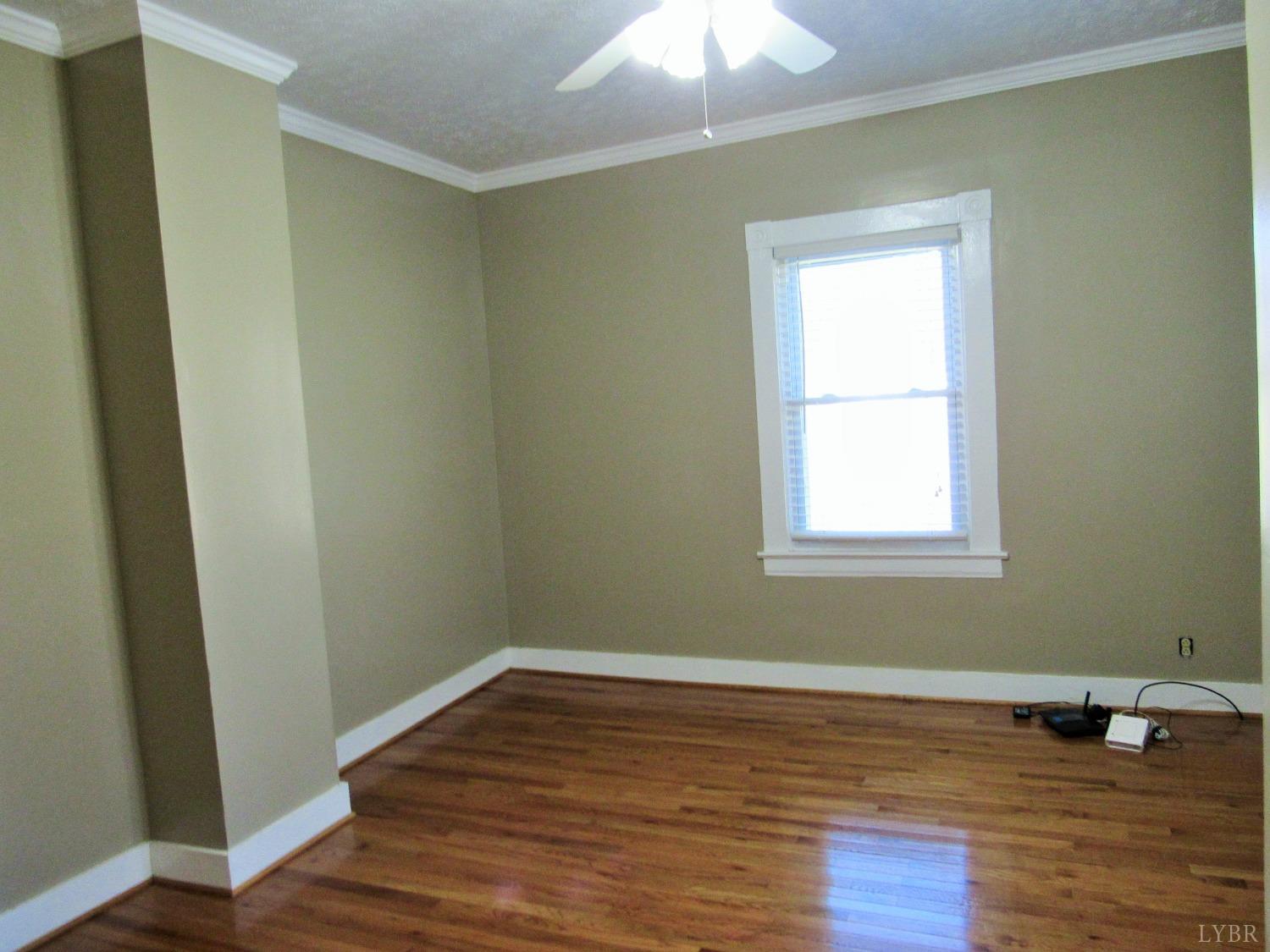 1697 South Amherst Highway Amherst, VA 24521 - Photo 24 of 45 a view of a room with wooden floor and a window