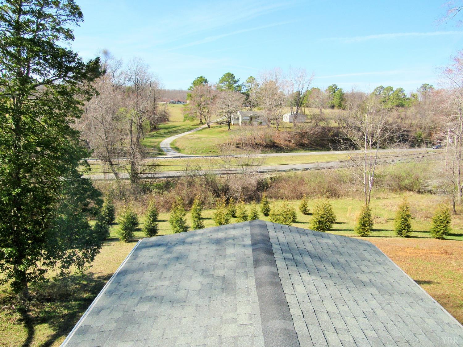 1697 South Amherst Highway Amherst, VA 24521 - Photo 29 of 45 a view of a swimming pool with an outdoor seating and a garden