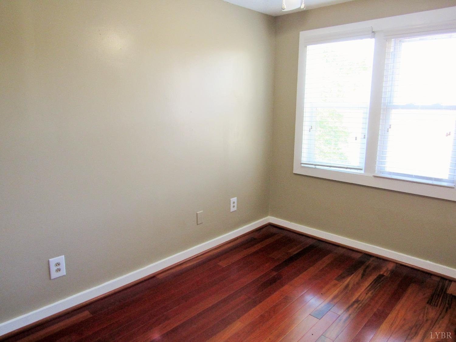 1697 South Amherst Highway Amherst, VA 24521 - Photo 30 of 45 a view of a room with wooden floor and a window