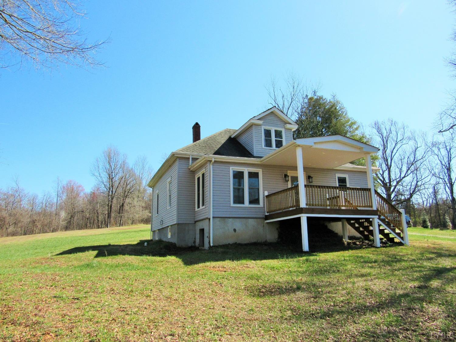 1697 South Amherst Highway Amherst, VA 24521 - Photo 4 of 45 a front view of a house with a yard