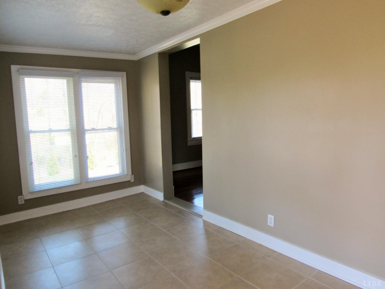 1697 South Amherst Highway Amherst, VA 24521 - Photo 9 of 45 an empty room with windows and closet