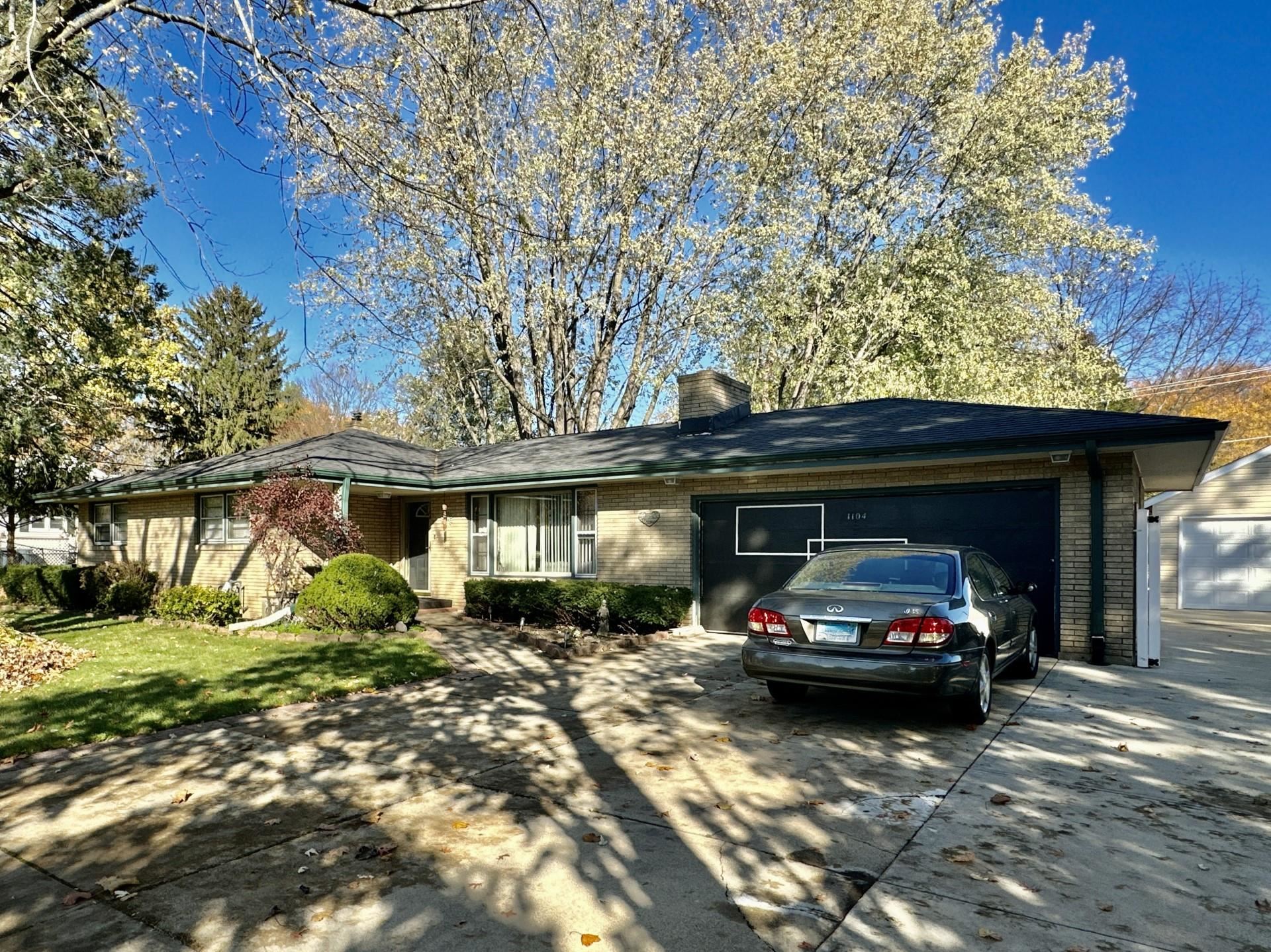 a car parked in front of a house