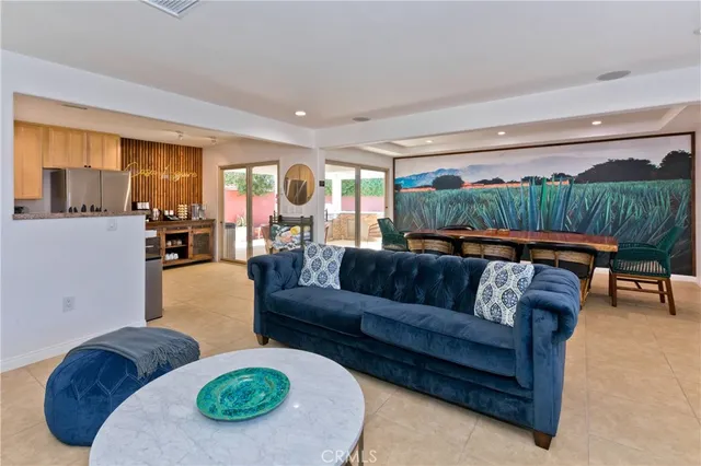 a living room with furniture and a couch