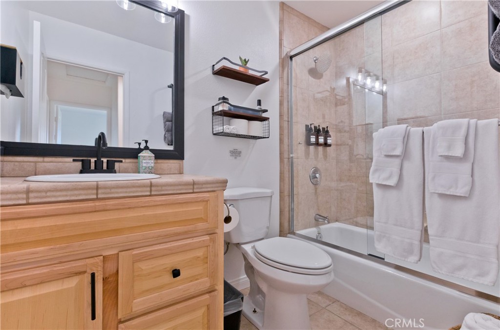 10510 Ocotillo Road Desert Hot Springs, CA 92240 - Photo 18 of 35 a bathroom with a sink a toilet and shower
