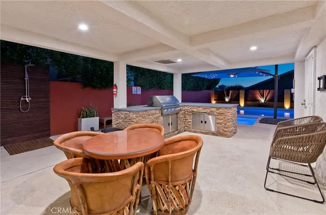 a view of a porch with furniture