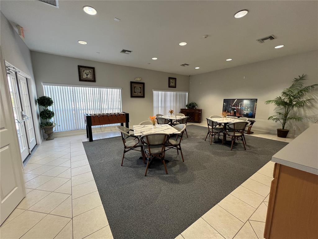 102 Sandy Point Way Clermont, FL 34714 - Photo 33 of 33 a living room with furniture a couch and a potted plant